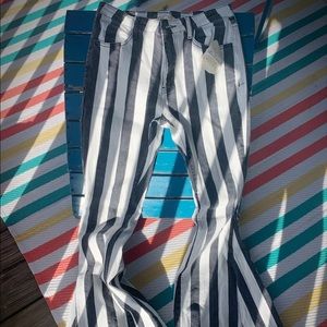 Altar’d state cream/dark blue bell bottom jeans.